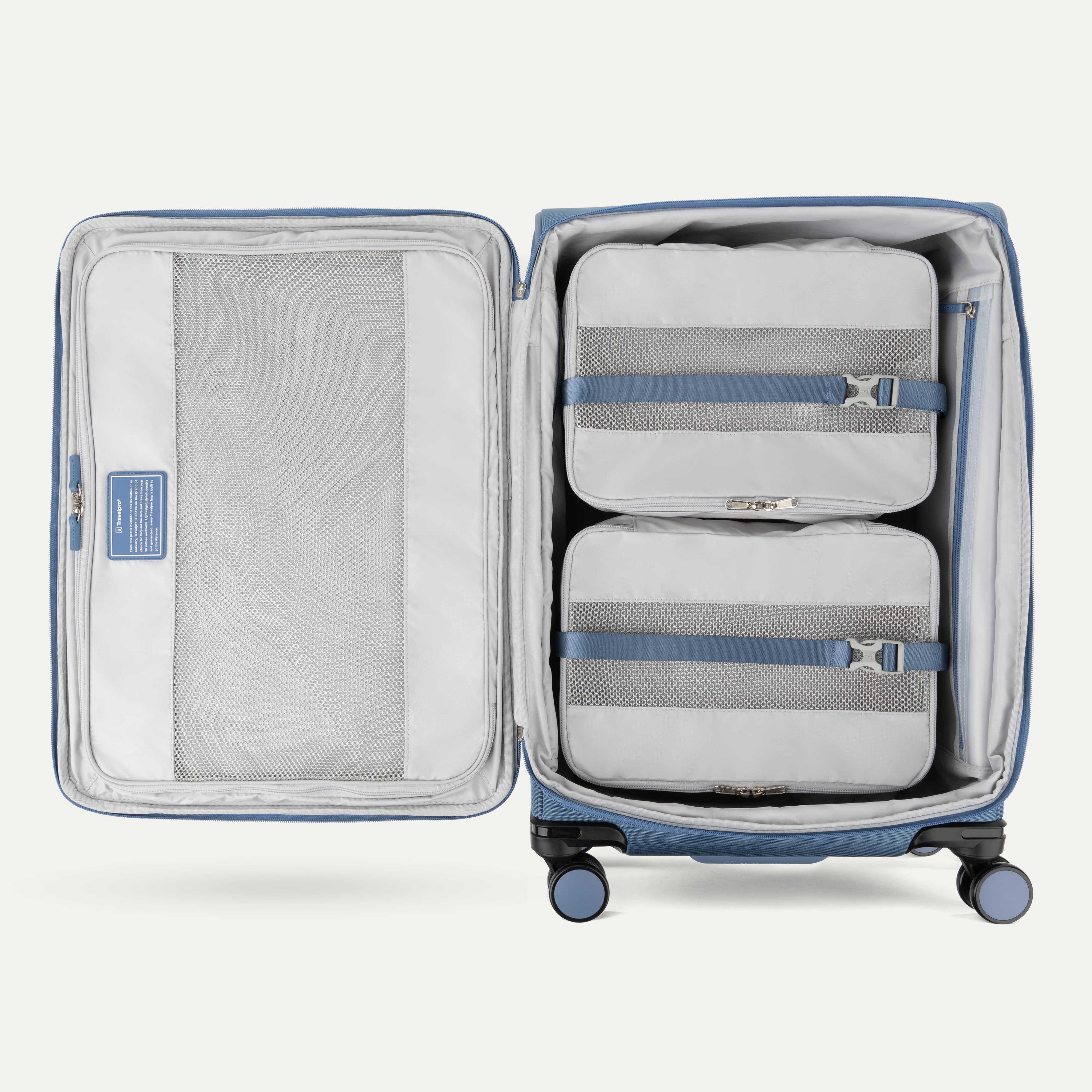 Interior of Baby Blue VersaPack+ Medium Check-In Luggage Spinner with Removable Compression Packing Cubes