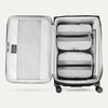 Water Resistant Interior of Black VersaPack+ Extra Large Checked Luggage Spinner with Compression Packing Organizers