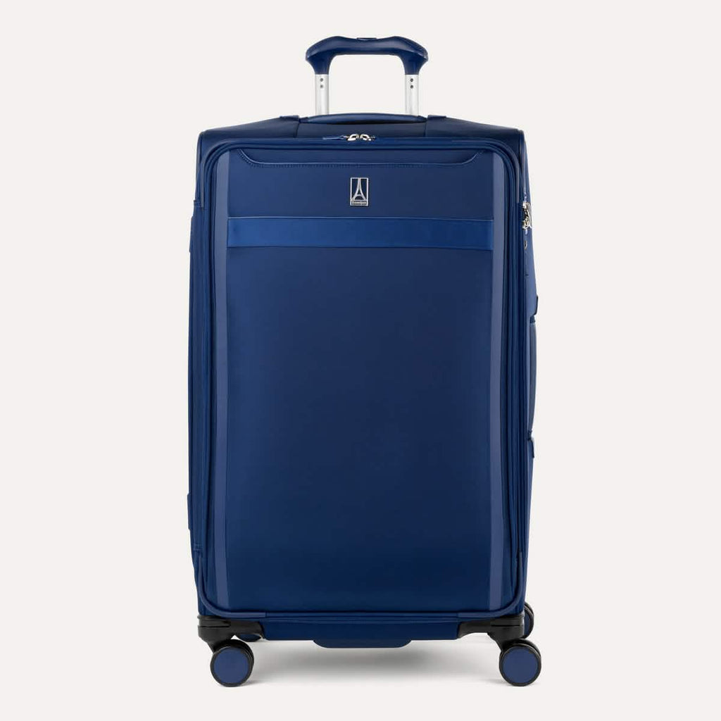 Front view of Travelpro VersaPack+ Large Check-In Spinner in Estate Blue, featuring 360° Spinner Wheels and PowerScope Extension Handle.
