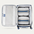 Water Resistant Interior of Blue VersaPack+ Extra Large Checked Luggage Spinner with Compression Packing Organizers
