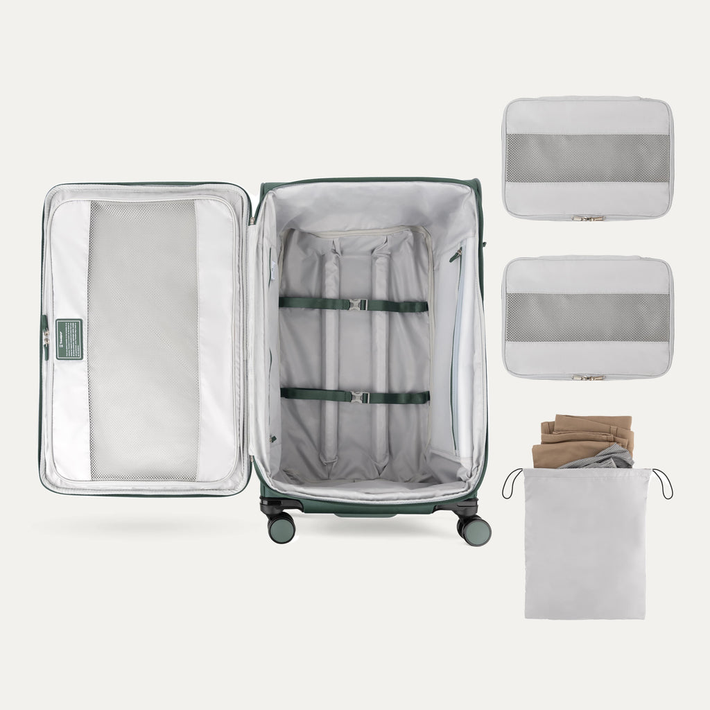 Water Resistant Interior of Green VersaPack+ Extra Large Checked Luggage Spinner with Compression Packing Organizers