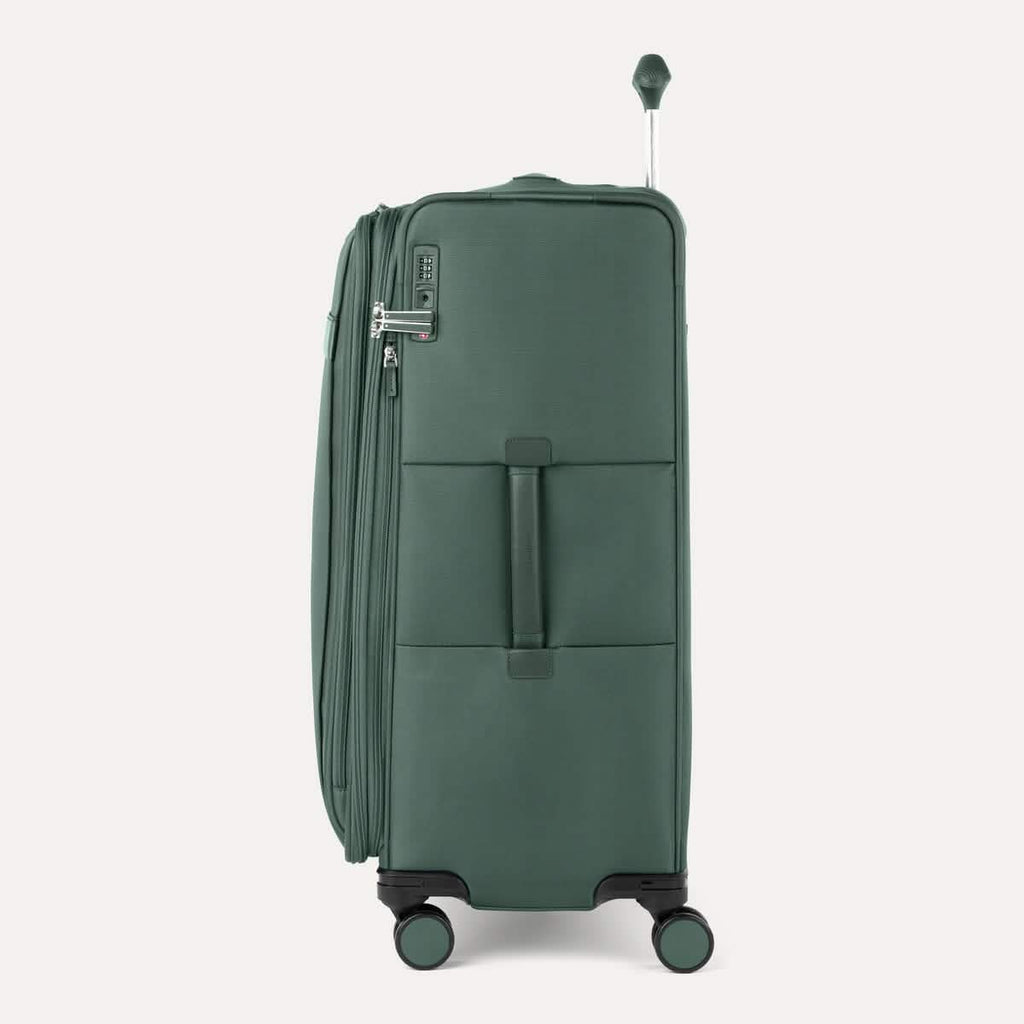 Side view of Travelpro VersaPack+ Large Check-In Spinner in Desert Sage Green, showing 360° spinner wheels and Contour Grip handle.
