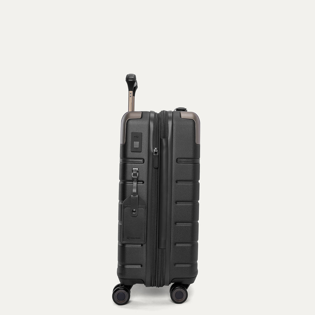 Side profile of the Travelpro Platinum Reserve Compact Carry-On Hardside Spinner in Black Dust