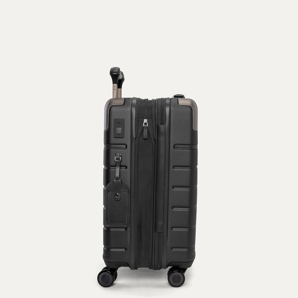 Side profile of the Travelpro Platinum Reserve Compact Carry-On Hardside Spinner in Black Dust, expanded for extra packing space