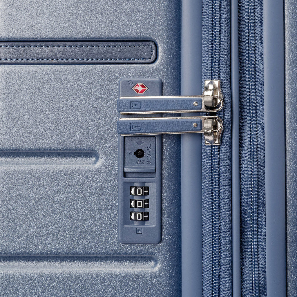 Close-up of the built-in TSA lock on the Travelpro Platinum Reserve Compact Carry-On Hardside Spinner in Steel Blue