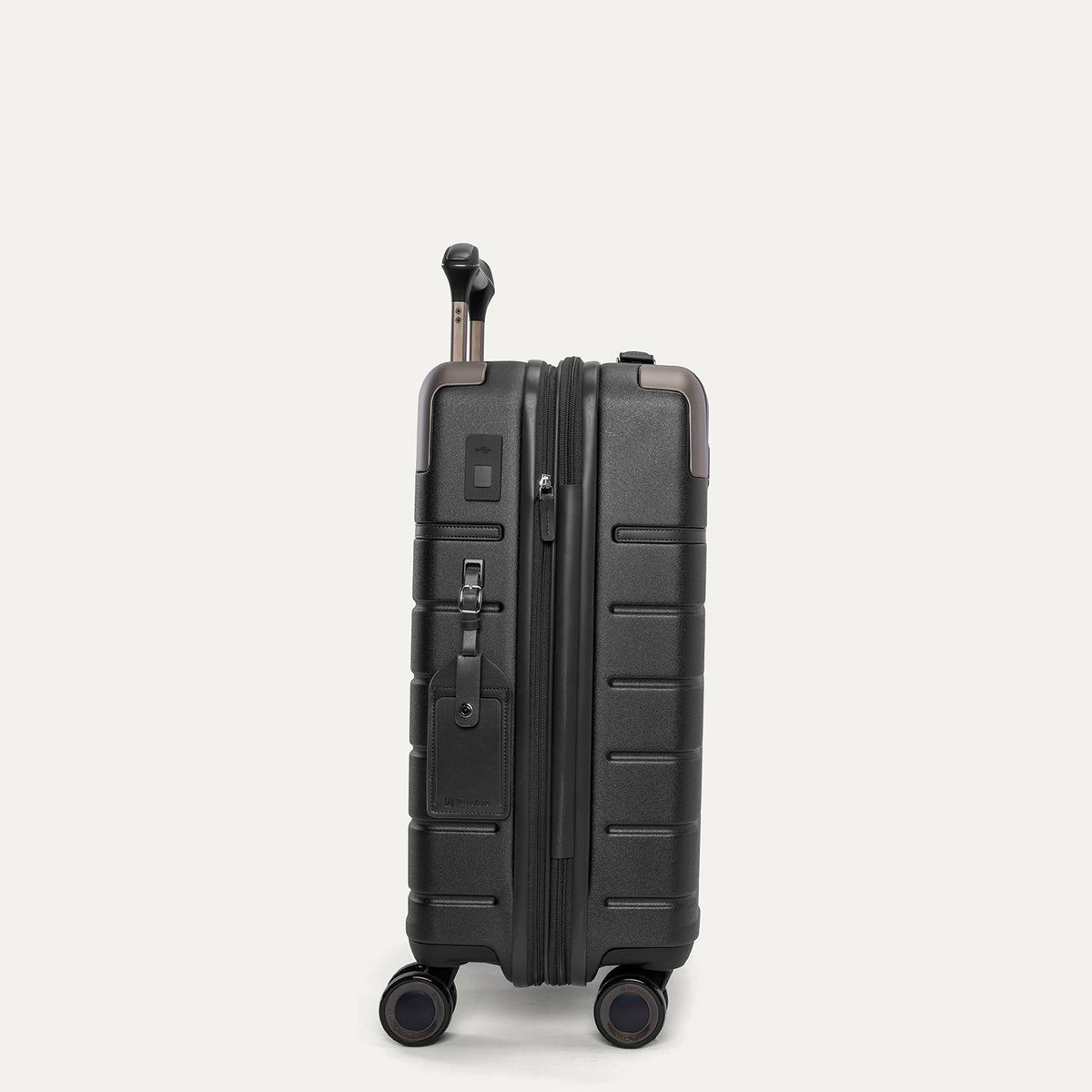 Side profile of the Travelpro Platinum Reserve Carry-On Hardside Spinner in Black Dust