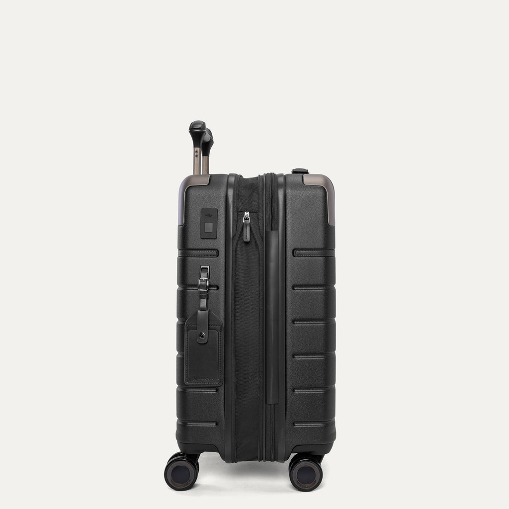 Side profile of the Travelpro Platinum Reserve Carry-On Hardside Spinner in Black Dust, expanded for extra packing space