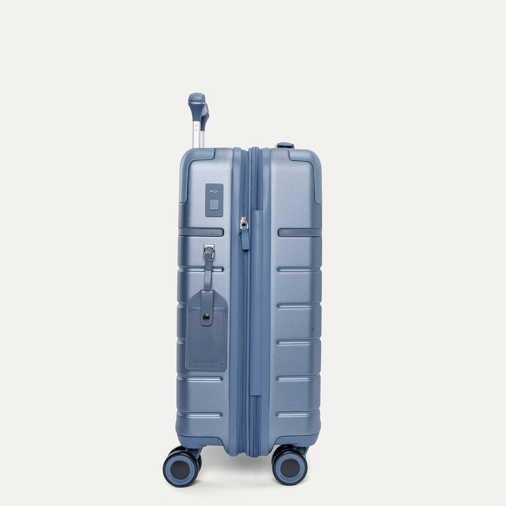 Side profile of the Travelpro Platinum Reserve Carry-On Hardside Spinner in Steel Blue