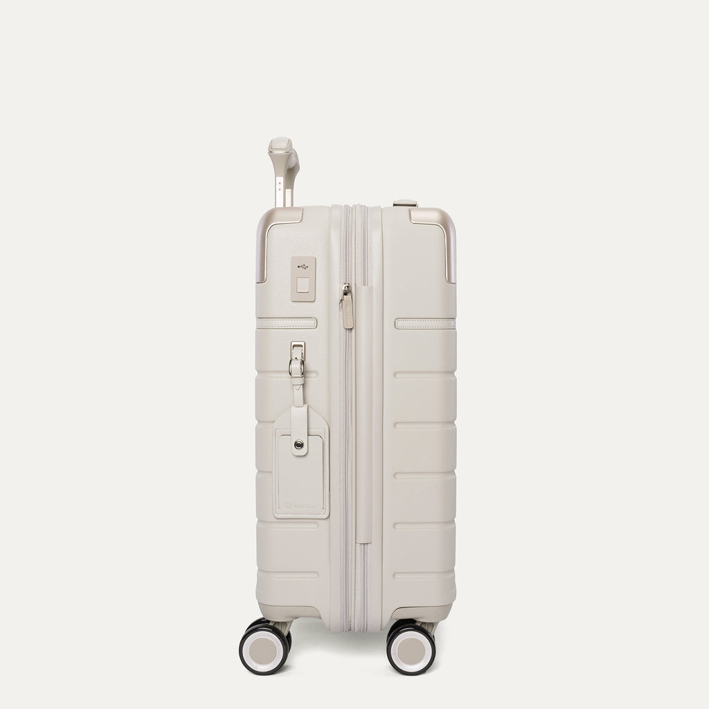 Side profile of the Travelpro Platinum Reserve Carry-On Hardside Spinner in Sandstone
