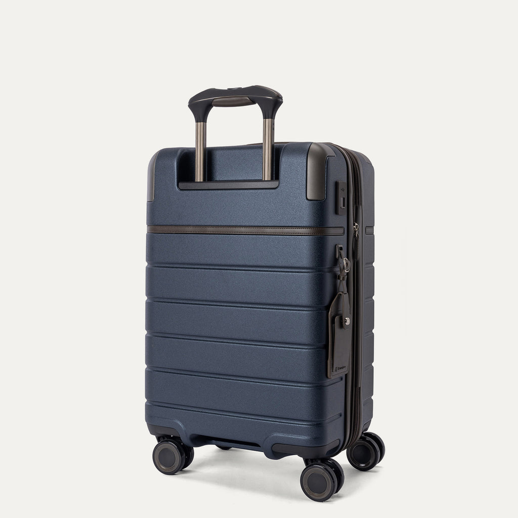Rear angled view of the Travelpro Platinum Reserve Carry-On Hardside Spinner in Midnight Trail