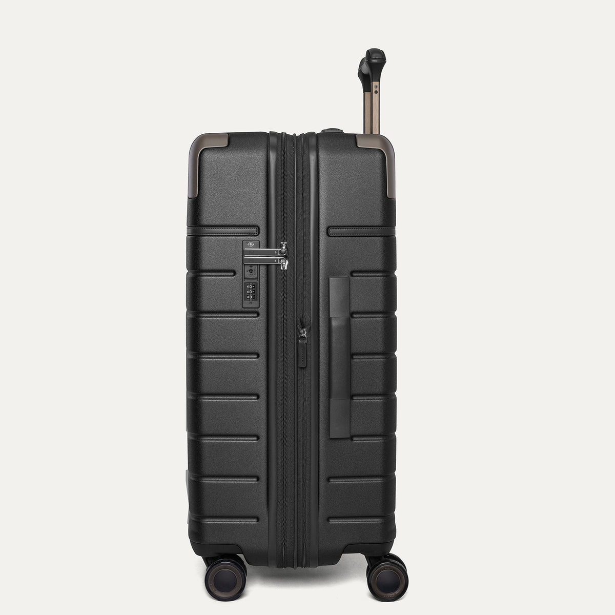 Side profile of the Travelpro Platinum Reserve Medium Check-In Hardside Spinner in Black Dust
