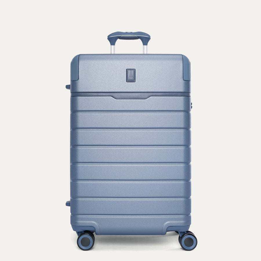 Front view of the Travelpro Platinum Reserve Medium Check-In Hardside Spinner in Steel Blue