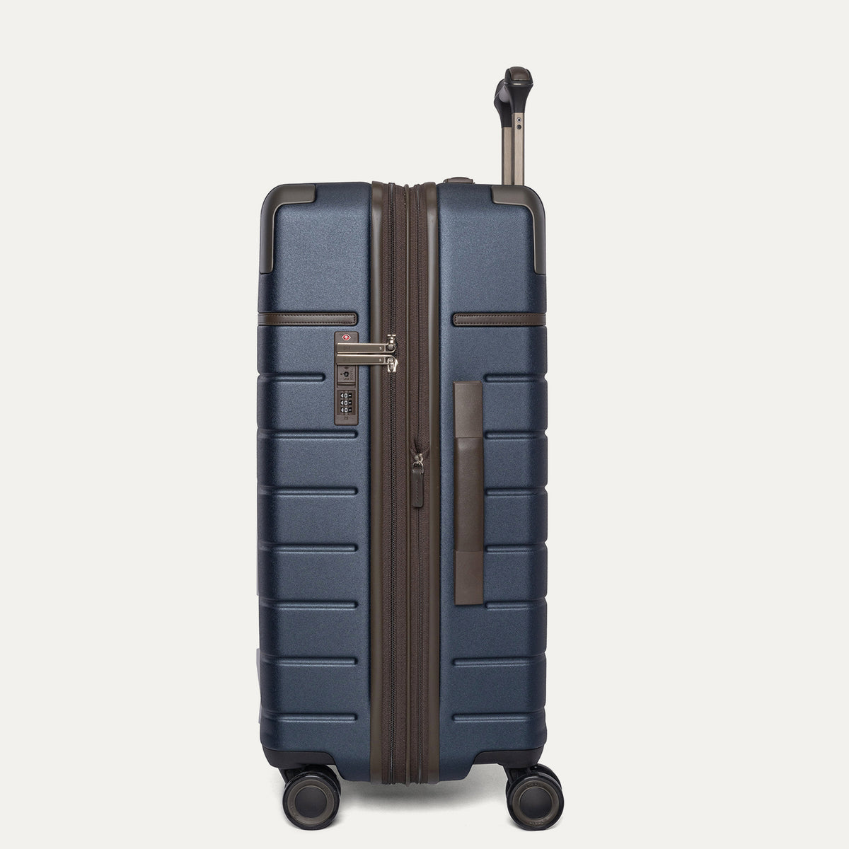Side profile of the Travelpro Platinum Reserve Medium Check-In Hardside Spinner in Midnight Trail