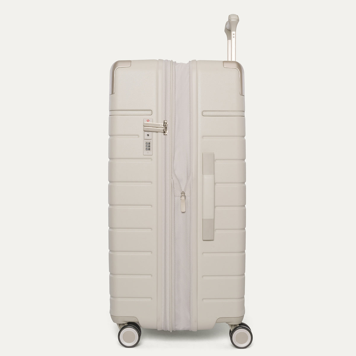 Side profile of the Travelpro Platinum Reserve Large Check-In Hardside Spinner in Sandstone, expanded for extra packing space