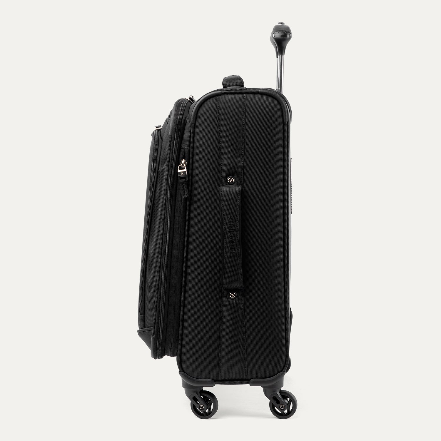 Side profile view of the Travelpro Runway Tote / Carry-on Luggage Set in Black, showing the softside carry-on spinner expanded with the side carry handle, side profile, and multi-directional wheels against a clean off-white background.