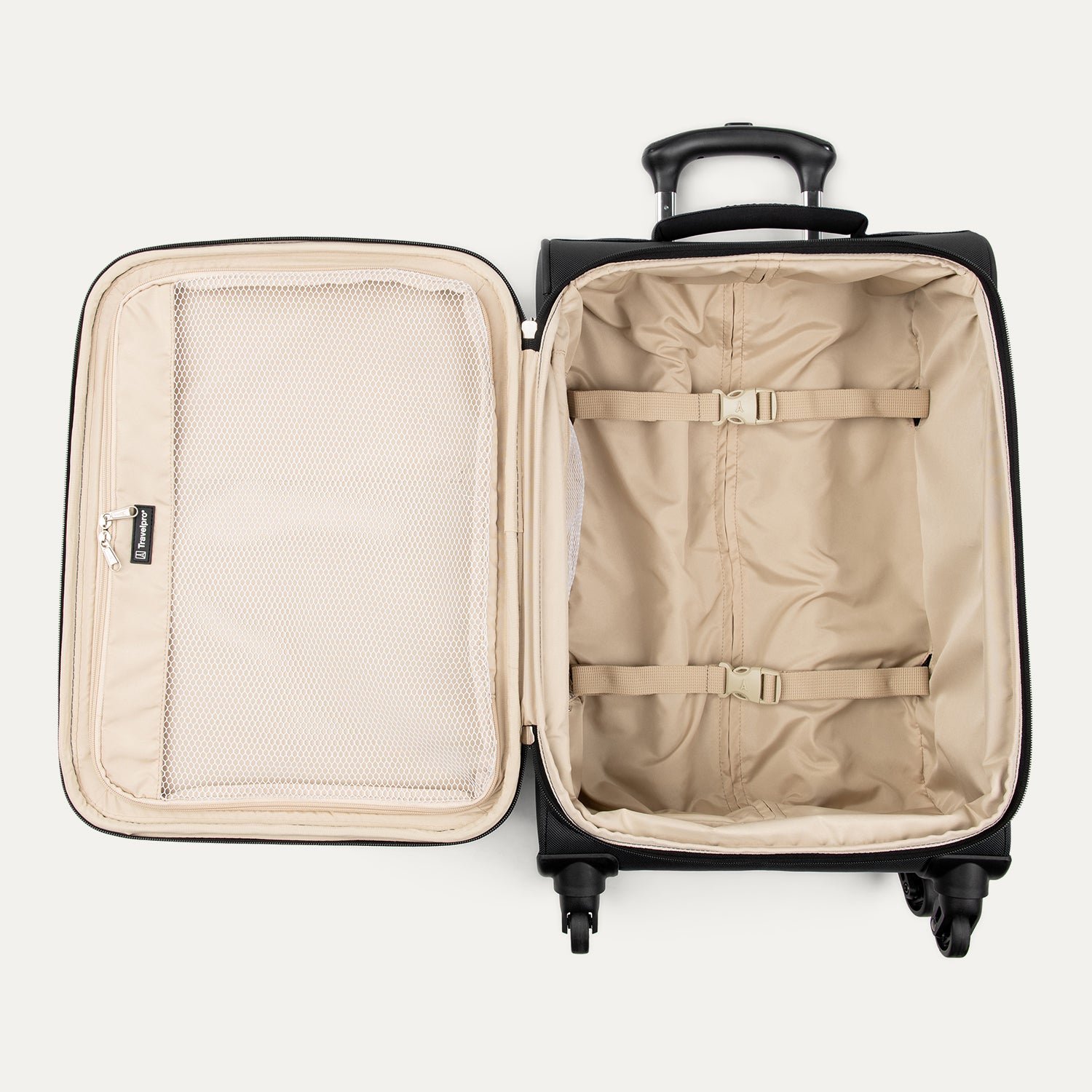 An open soft-side carry-on suitcase shown from above, featuring a black exterior and a beige interior with a zippered mesh panel pocket on the lid and adjustable compression straps in the main packing compartment.