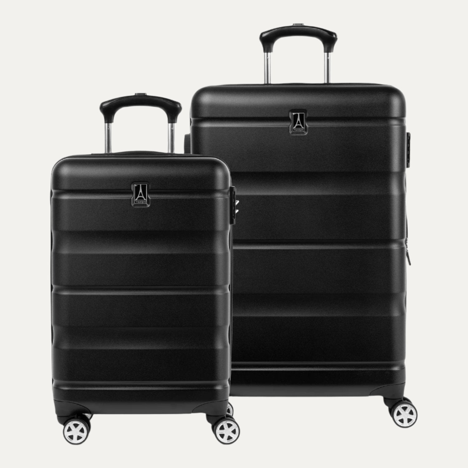 A set of two black hardside carry-on and checked luggage pieces with spinner wheels and telescopic handles.