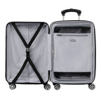 Interior view of hardside spinner with zippered divider panel and cross straps for organized packing.
