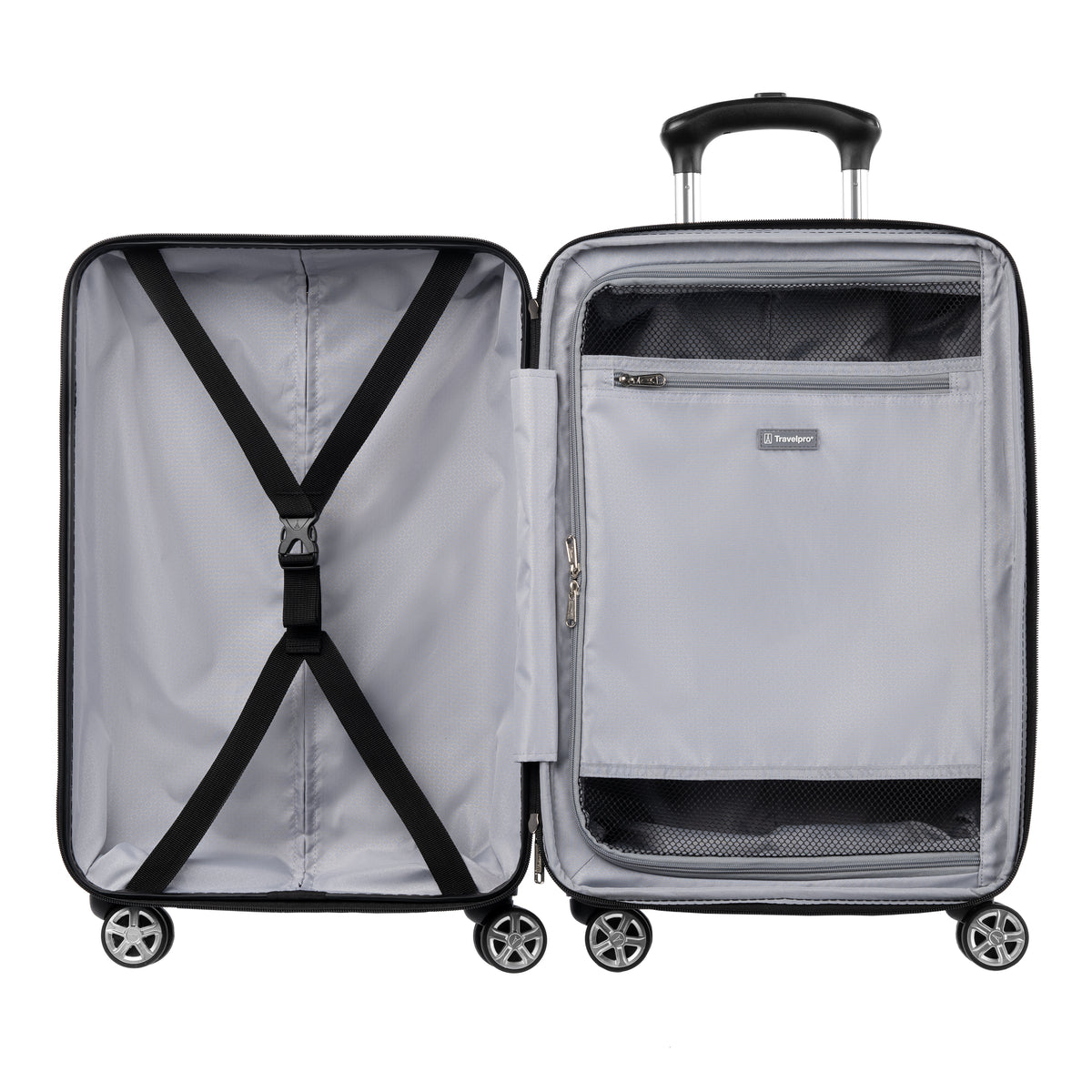 Interior view of hardside spinner with zippered divider panel and cross straps for organized packing.
