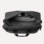 Top view of Travelpro Altitude Double Expansion Duffel in Jet Black with open main compartment and visible interior pockets.

