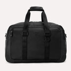 A black Travelpro Altitude Double Expansion Duffel bag with multiple compartments and zipper closure.