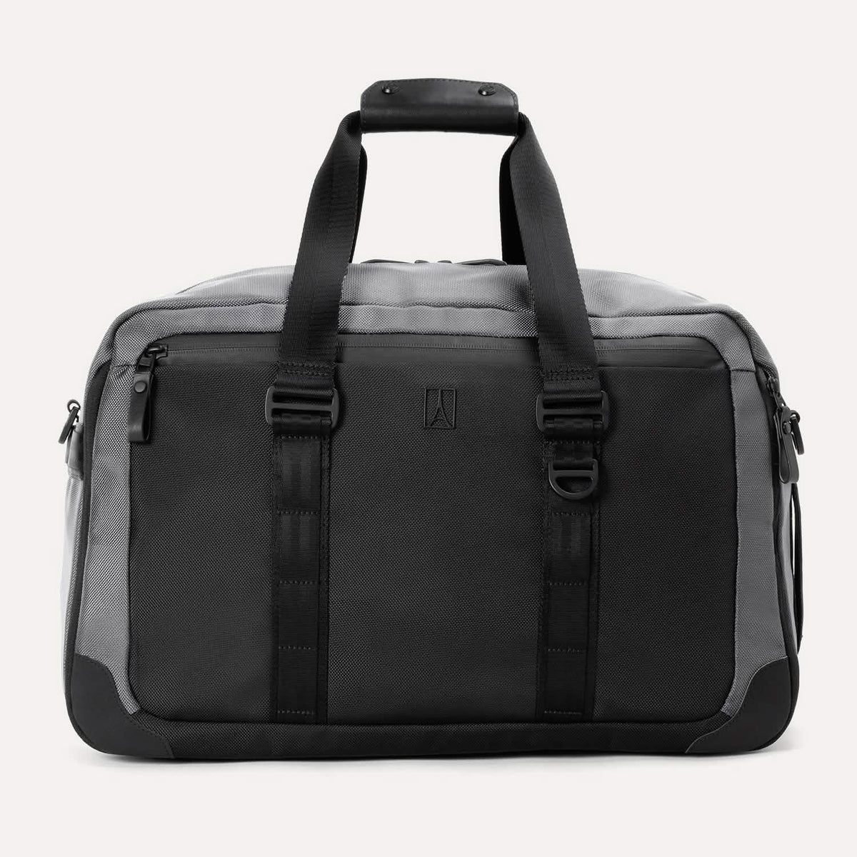  Front view of the Travelpro® Altitude™ Double Expansion Duffel in Falcon Grey, featuring dual carry handles with a padded grip, a large front panel, and a zippered pocket on the upper left.
