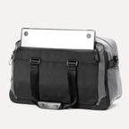 Rear view of the Travelpro® Altitude™ Double Expansion Duffel in Falcon Grey, showing an exterior zip pocket with a laptop partially inserted.







Ask ChatGPT
