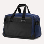 Front view of Travelpro Altitude Double Expansion Duffel in Aviator Navy, showing top handles and front zippered pocket.
