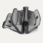 Open view of the Travelpro® Altitude™ Full Expansion Brief in Falcon Grey, showing three spacious compartments with divider panels and organizational sleeves.
