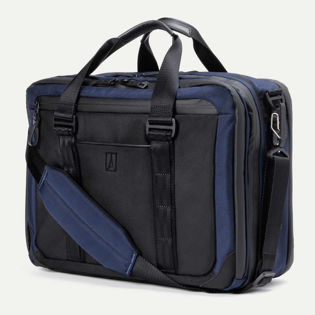 Travelpro® Altitude™ Full Expansion Brief in Aviator Navy shown with an adjustable padded shoulder strap, dual top handles, multiple zippered compartments, and reinforced detailing for durability.
