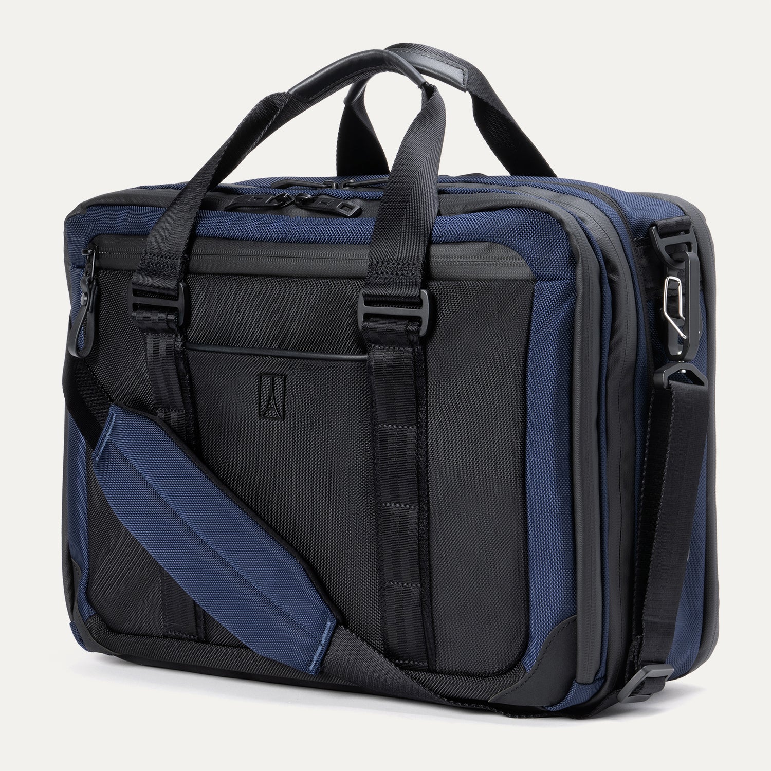 Travelpro® Altitude™ Full Expansion Brief in Aviator Navy shown with an adjustable padded shoulder strap, dual top handles, multiple zippered compartments, and reinforced detailing for durability.
