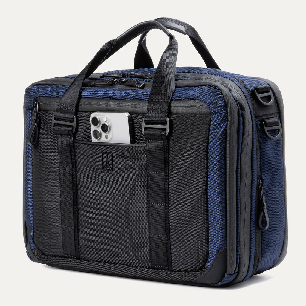 Travelpro® Altitude™ Full Expansion Brief in Aviator Navy featuring dual top handles, multiple zippered compartments and a front slip pocket suitable for items like a smartphone.
