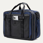 Travelpro® Altitude™ Full Expansion Brief in Aviator Navy featuring dual top handles, multiple zippered compartments and a front slip pocket suitable for items like a smartphone.
