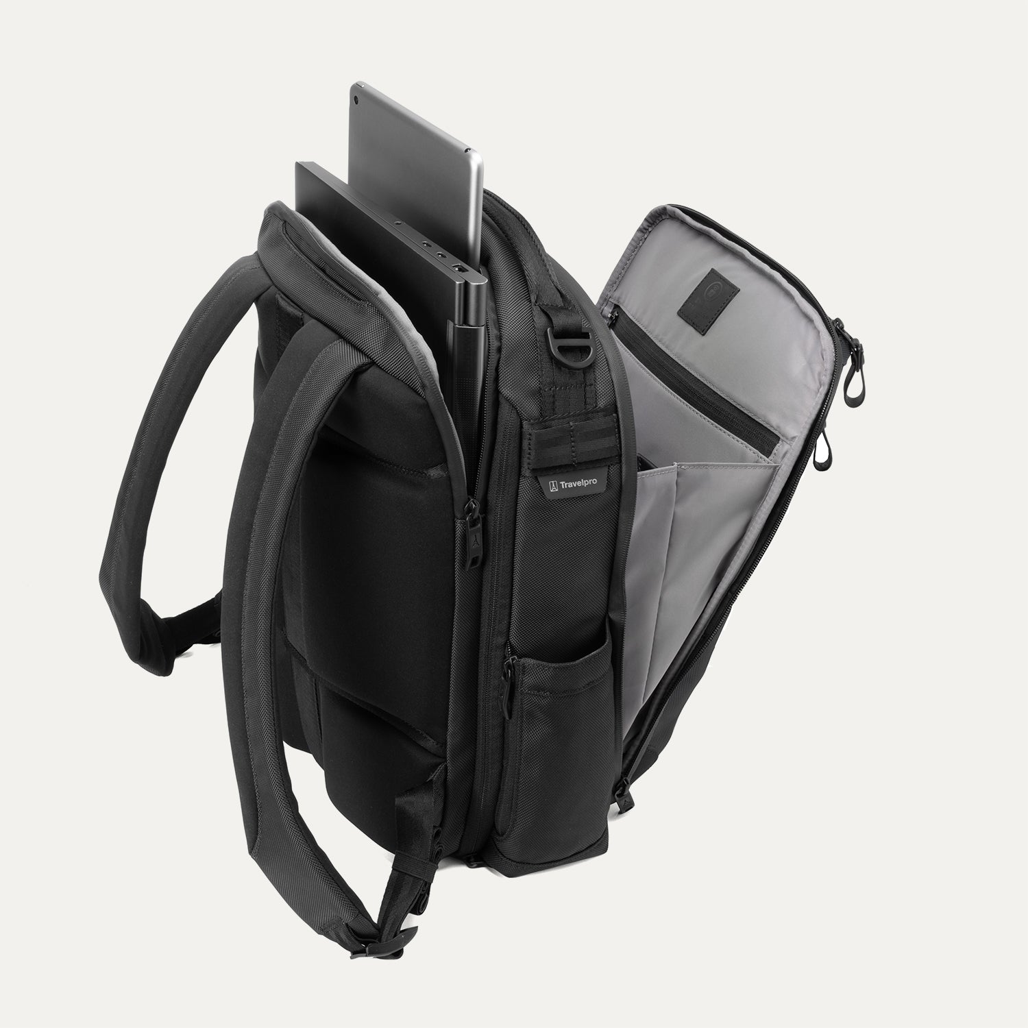 best small travel backpack with padded straps Travelpro Altitude Slim Expandable Laptop Backpack 20-24L in Falcon Grey