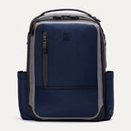 Front view of the Travelpro Altitude Slim Expandable Laptop Backpack 20-24L in Stellar Navy and Grey, showcasing its sleek, professional design, front-facing brand logo, and convenient exterior storage pocket.