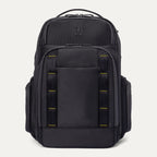front view of the Travelpro Altitude Large Backpack in Neon Shadow, showing black textured exterior with neon yellow stitching accents, multiple zippered compartments, and side pocket against a light background.