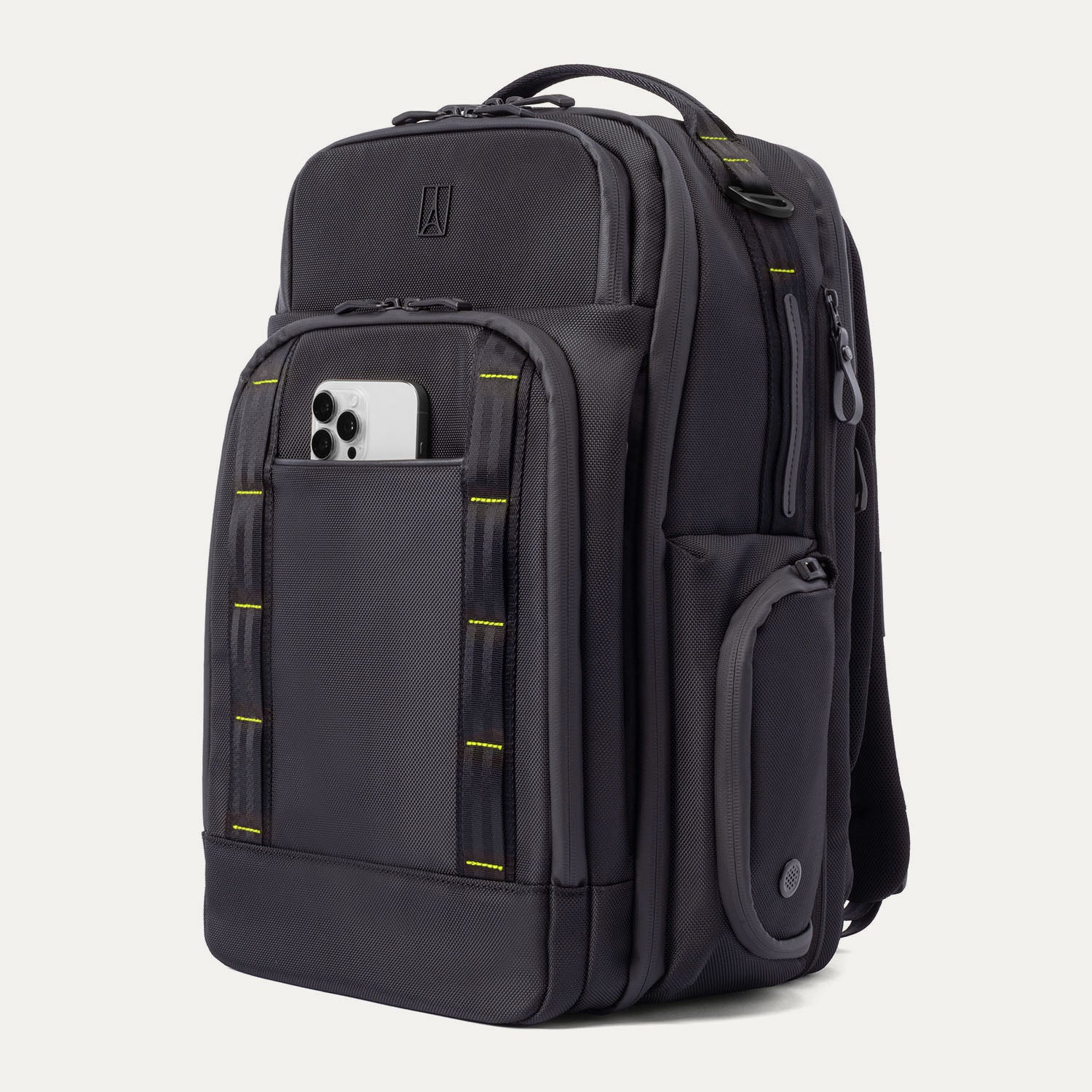 Three‑quarter front view of the Travelpro Altitude Large Backpack in Neon Shadow, showing black textured exterior with neon yellow stitching accents, multiple zippered compartments, and an Phone in the front pocket against a light background.