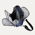 Interior view of Travelpro Altitude Crossbody 6L in Aviator Navy, with multiple compartments and padded tablet sleeve.
