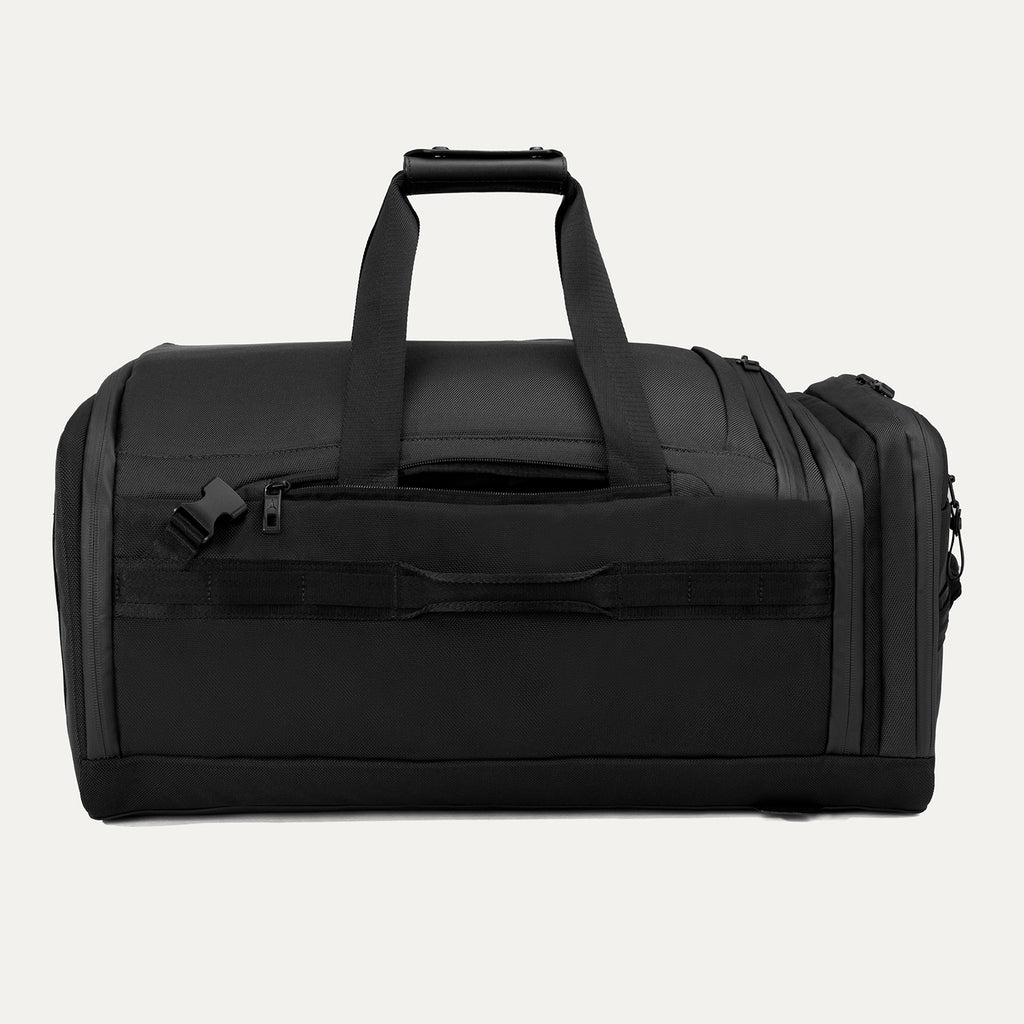 Rear duffel view of the Travelpro Altitude Convertible Duffel/Backpack in Jet Black, showing backpack straps, side handle, and zippered pocket.
