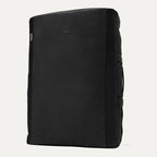 Upright front view of the Travelpro Altitude Convertible Duffel/Backpack in  Jet Black, showing smooth base panel with subtle logo detailing.
