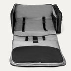 Open backpack with gray interior and black exterior on a white background
