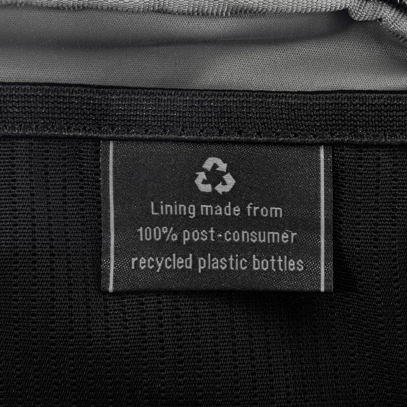 Close-up of interior tag showing that the lining is made from 100% post-consumer recycled plastic bottles.
