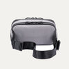 Rear view of the Travelpro Altitude Sling 2L in Stellar Navy/Grey, showing the adjustable waist strap and back panel.