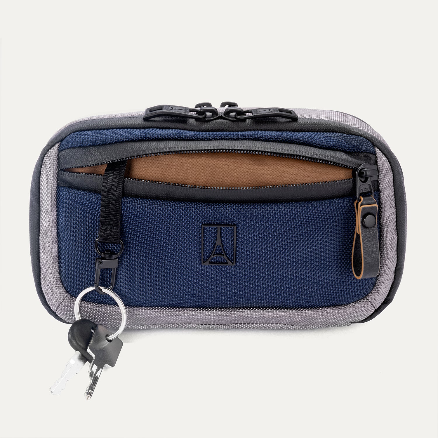 Front view of the Travelpro Altitude Sling 2L in Stellar Navy/Grey, featuring a front zip pocket and key leash
