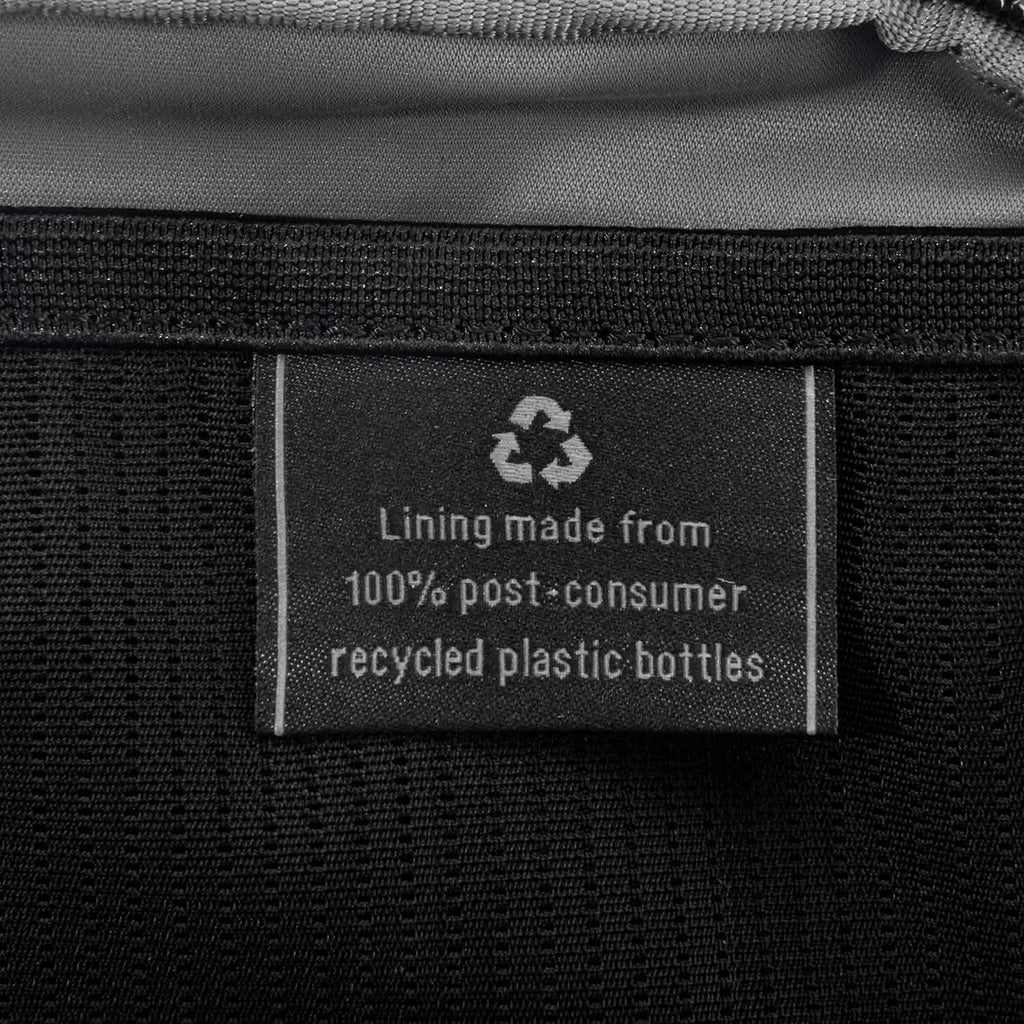 Close-up of interior tag showing that the lining is made from 100% post-consumer recycled plastic bottles.
