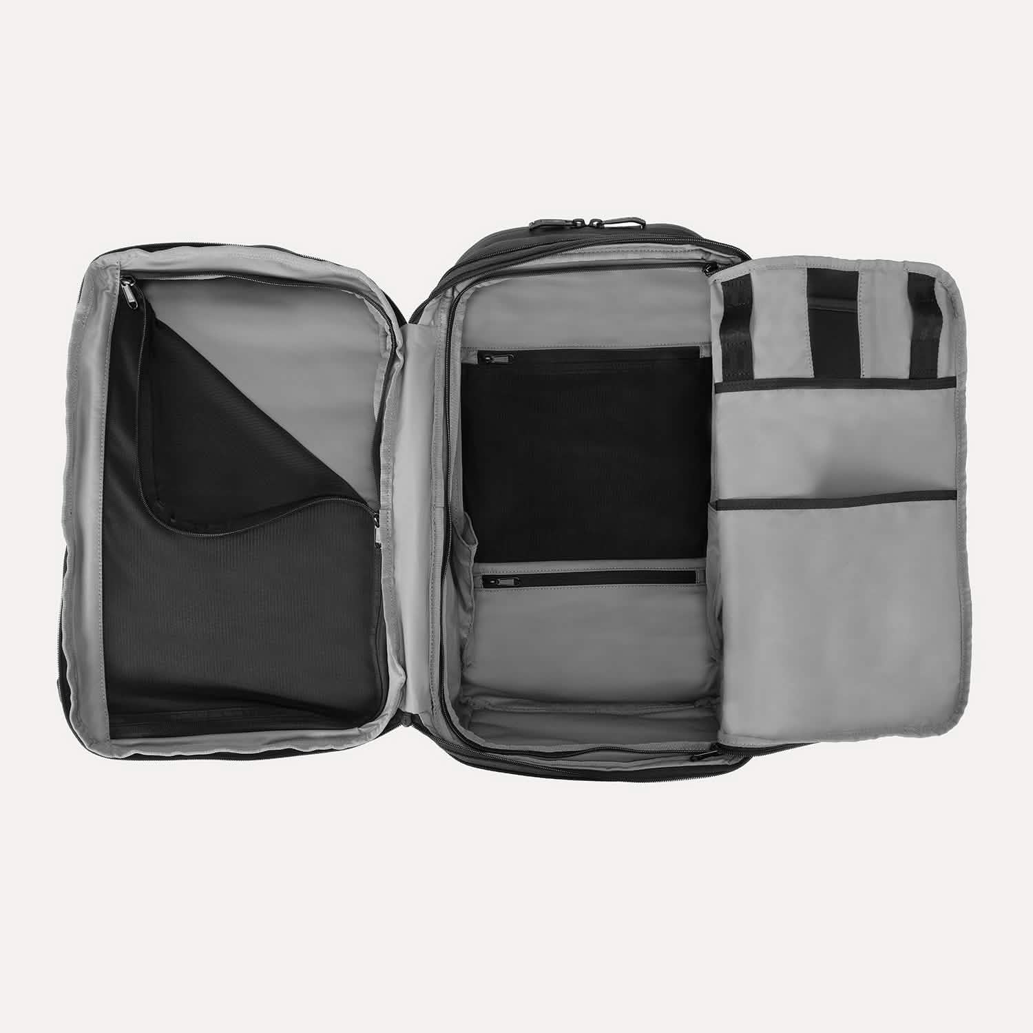 Interior view of Travelpro Altitude All-Purpose Laptop Backpack in Jet Black, featuring multiple compartments and zippered mesh pockets.
