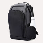 Front angled view of Travelpro Altitude All-Purpose Laptop Backpack in Falcon Grey, featuring an exterior bottle pocket.
