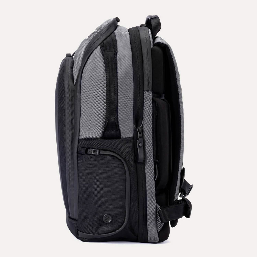 Side view of Travelpro Altitude All-Purpose Laptop Backpack in Falcon Grey
