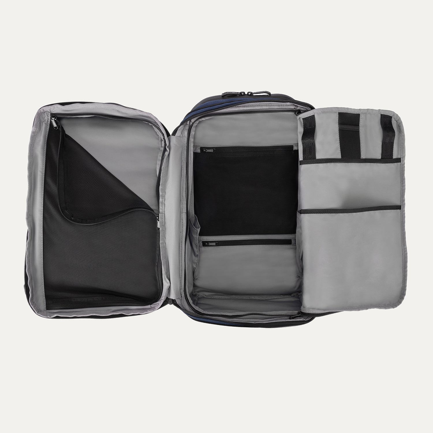 Interior view of the Travelpro Altitude All-Purpose Backpack in Aviator Navy, showing multiple compartments and mesh zippered pockets.
