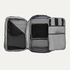 Interior view of the Travelpro Altitude All-Purpose Backpack in Aviator Navy, showing multiple compartments and mesh zippered pockets.
